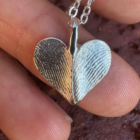 Silver heart shaped fingerprint pendant