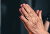 Close up of elderly person's hands