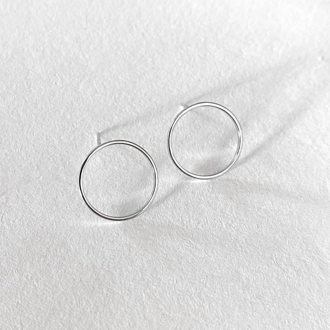 Silver hollow circle stud earrings