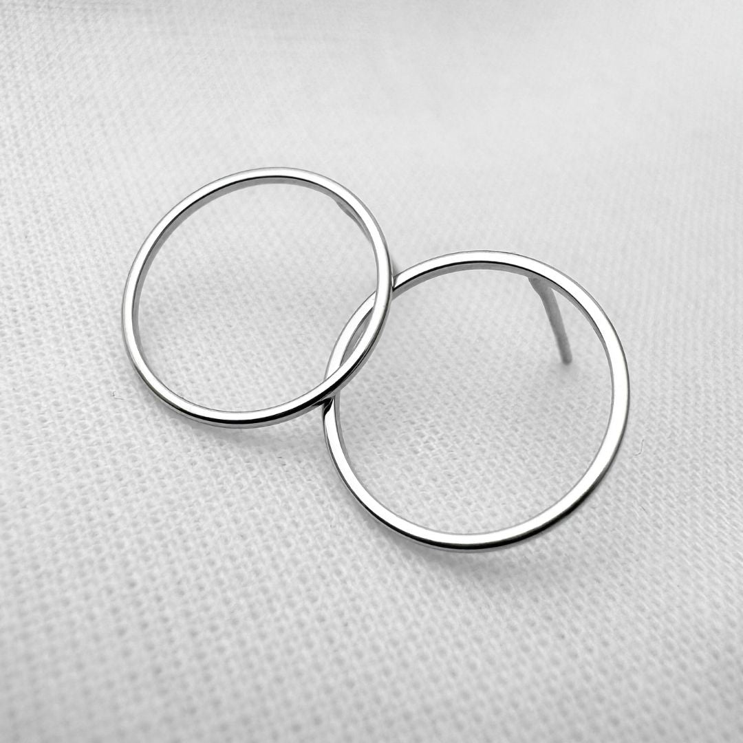 Round silver stud earrings