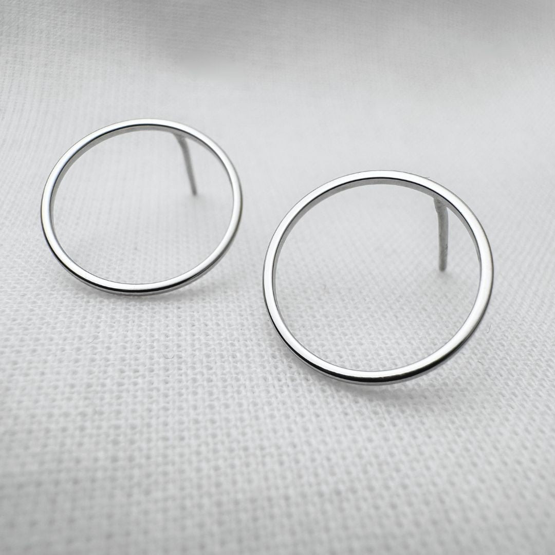 Round silver stud earrings