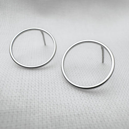 Round silver stud earrings