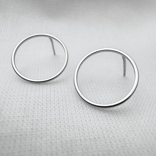 Round silver stud earrings