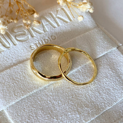 Thin gold Etta ring and Lucy wave band in gold