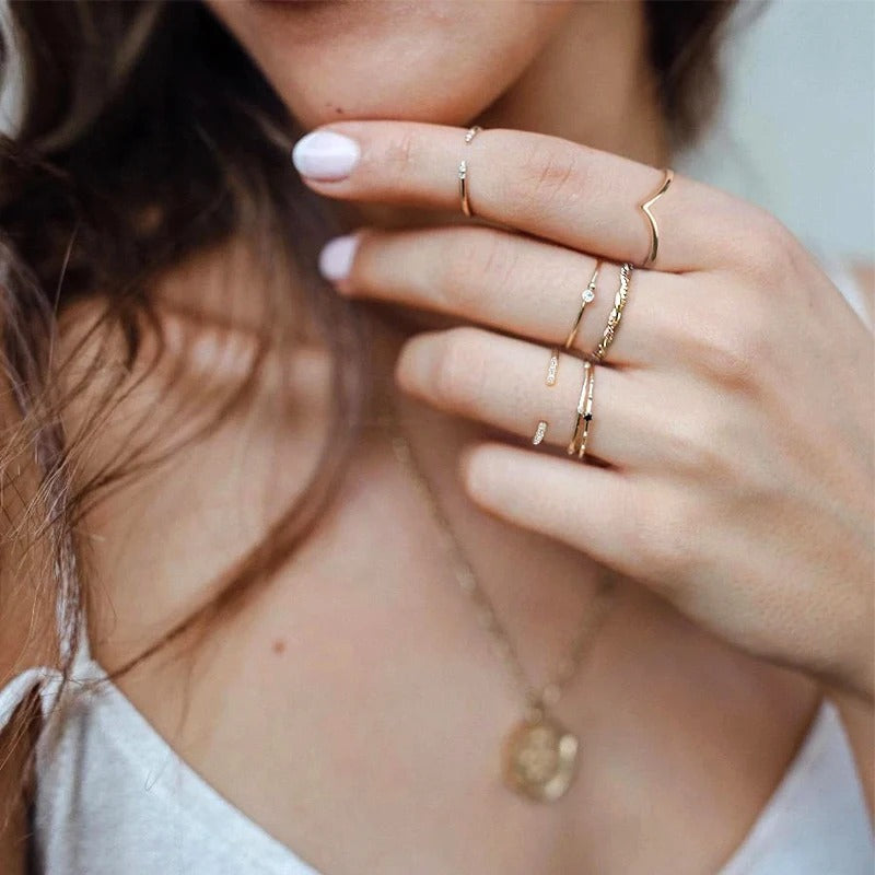 Lady wearing 18K gold plated rings