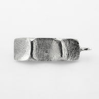 Silver family fingerprint bar pendant on light grey background