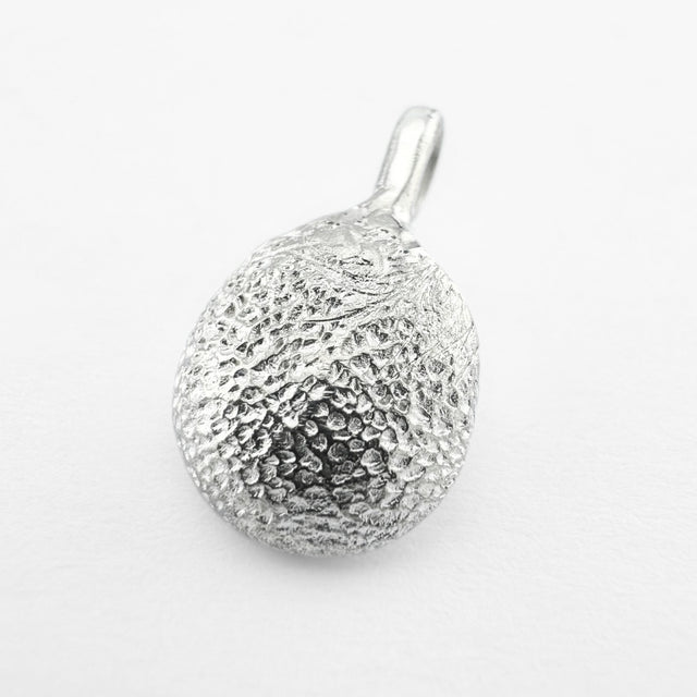 Silver paw print pendant on light grey background