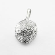 Silver paw print pendant on light grey background