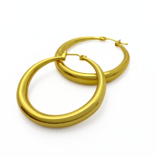 Thick gold hoop earrings