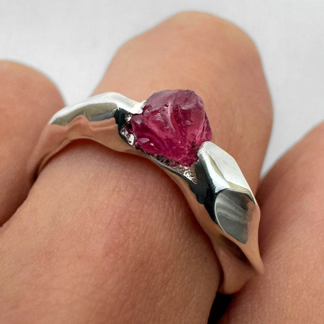 Handmade jagged silver ring with rough sapphire