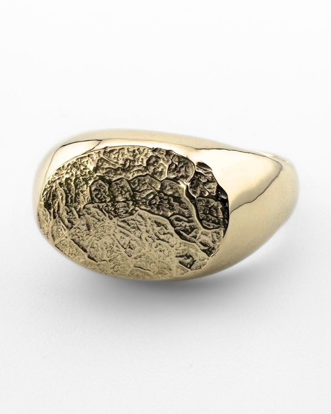 Gold oval signet ring with dog's nose print impression