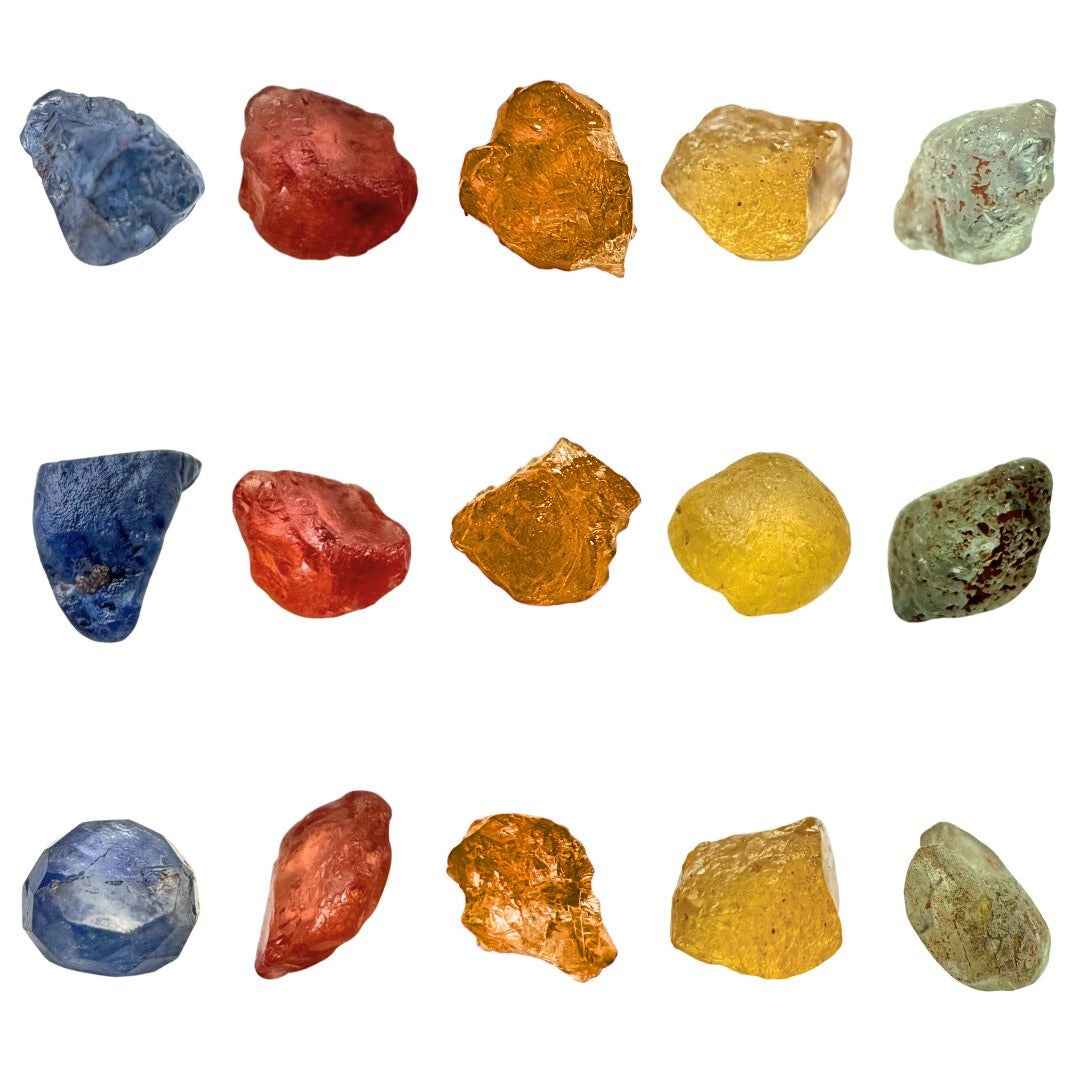 Rough coloured sapphires on white background