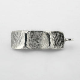 Sterling silver family fingerprint pendant on light grey background