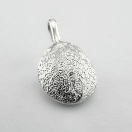 Sterling silver dogs nose print pendant on light grey background