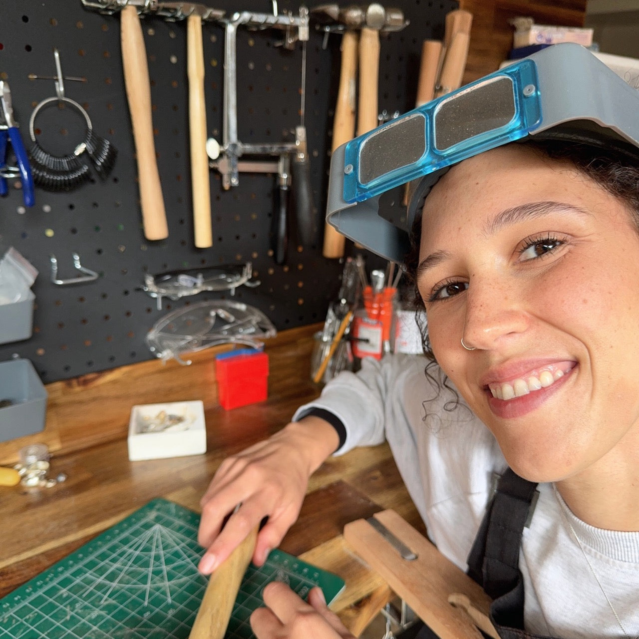 Jeweller at her workbench