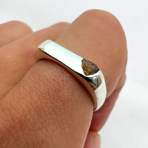 Thin silver signet ring with rough sapphire