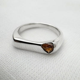 Thin silver signet ring with rough sapphire