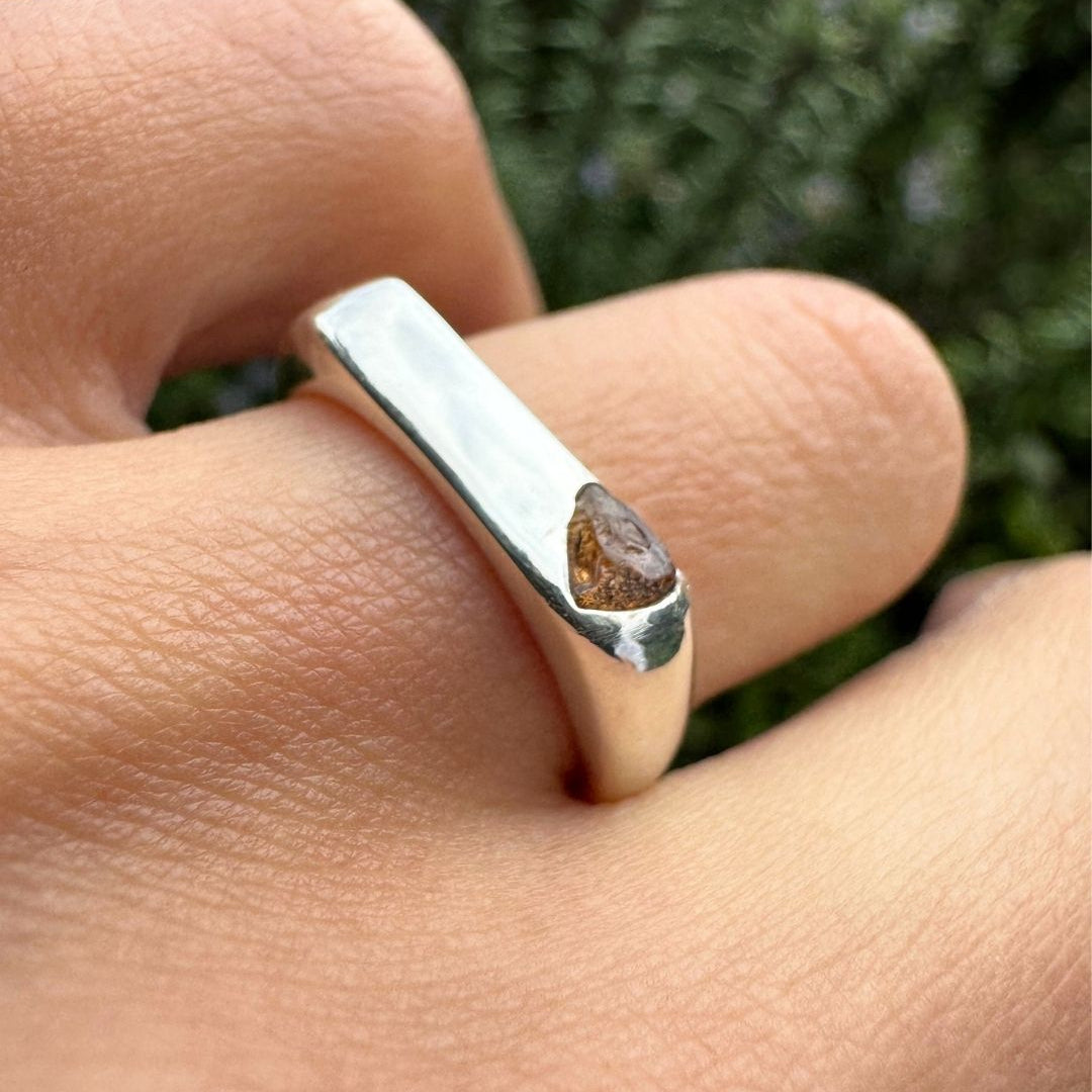 Thin silver signet ring with rough sapphire