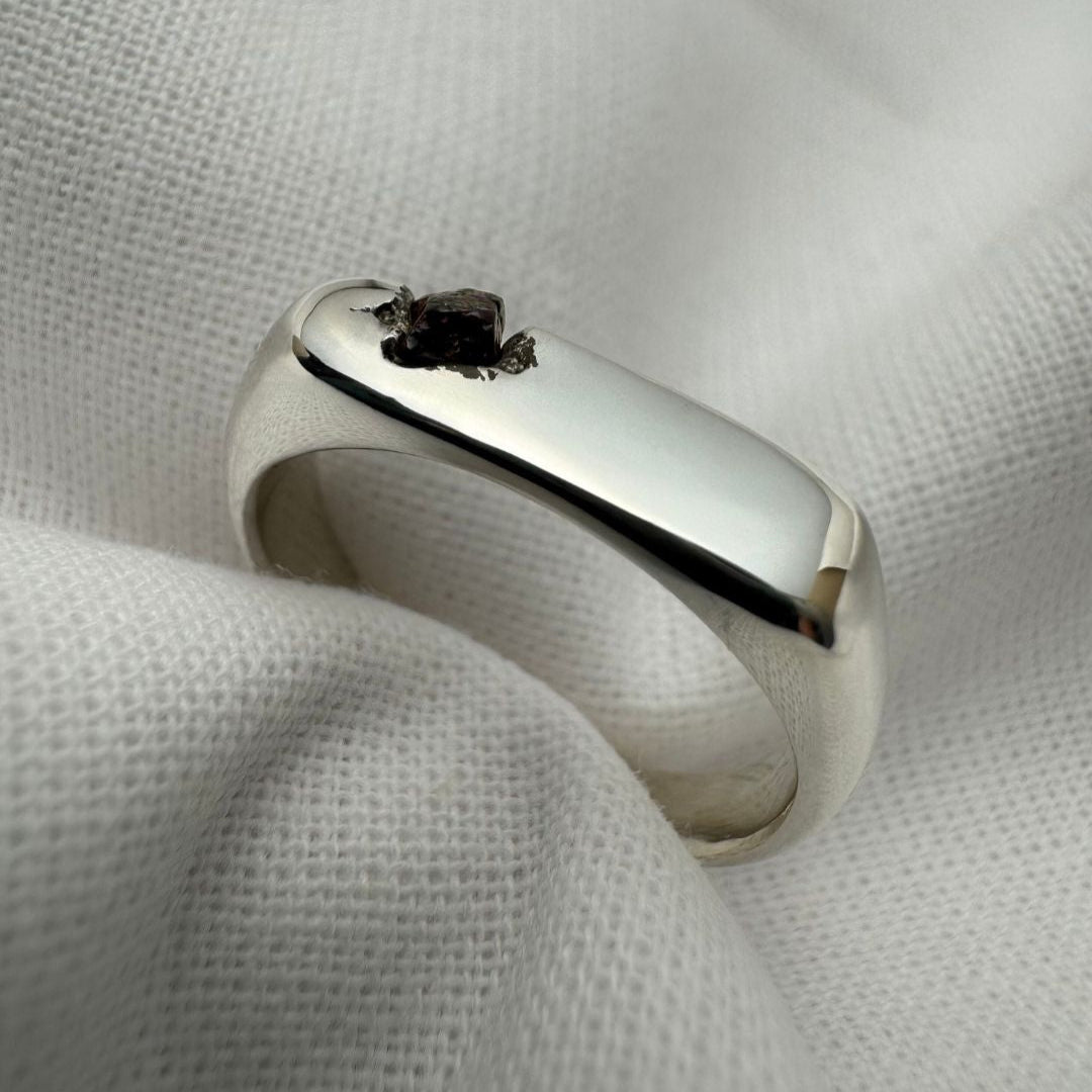 Thin silver signet ring with rough sapphire