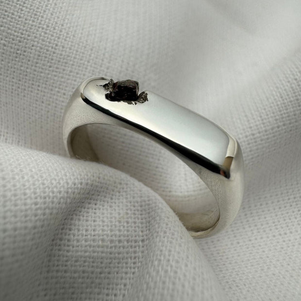 Thin silver signet ring with rough sapphire