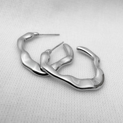 Wave cuff earrings