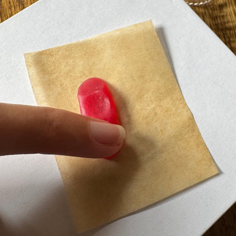 Taking family fingerprint wax impressions