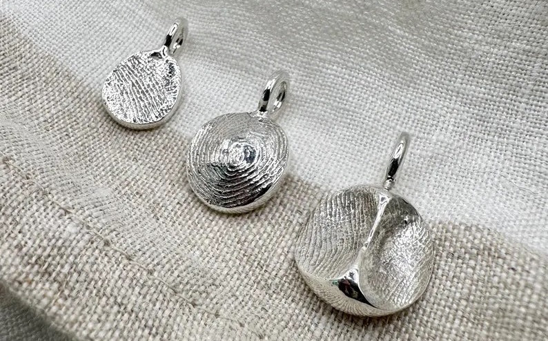 Fingerprint impression pendants in sterling silver 